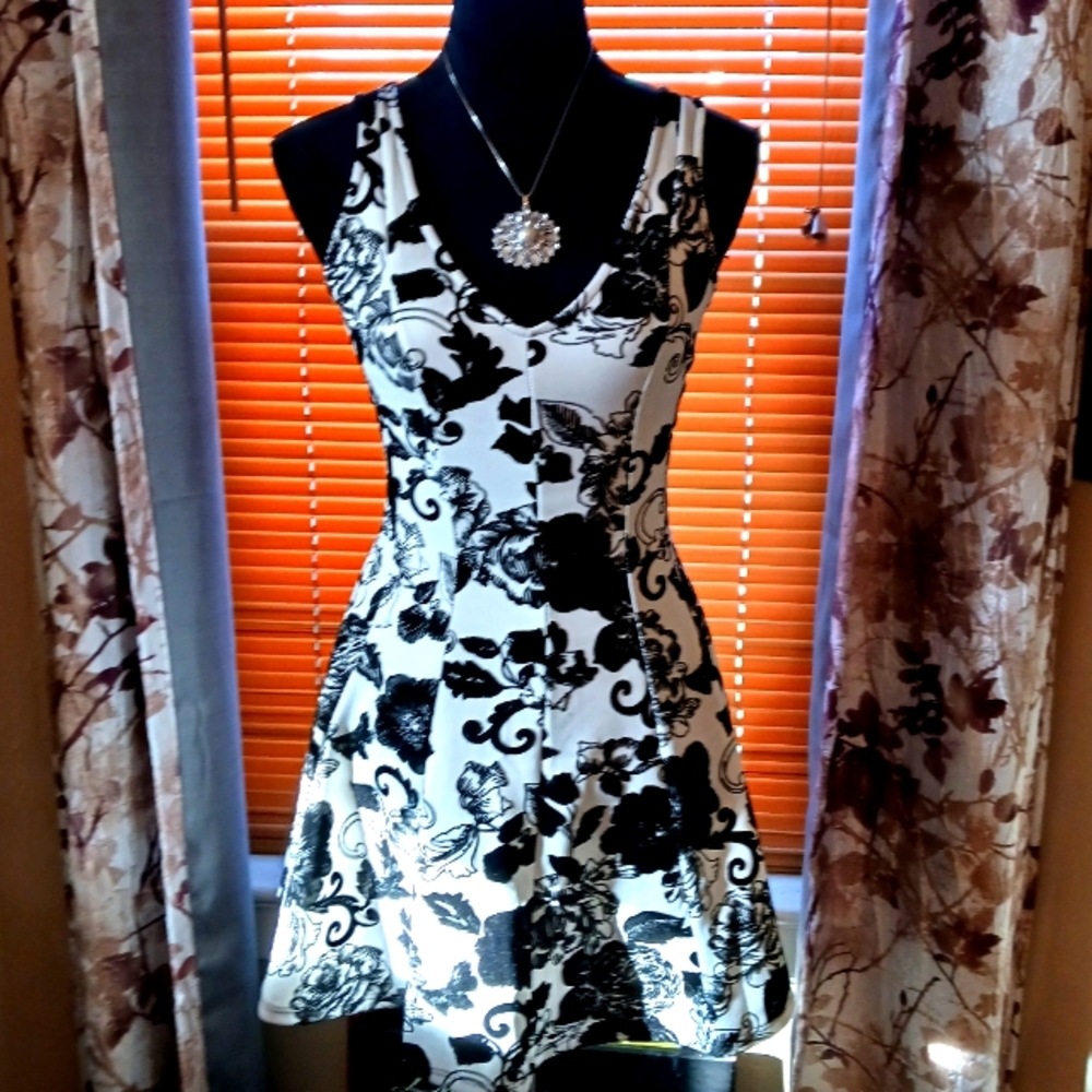 A gorgeous black and white dress manufactured by Dotted.